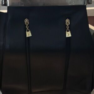 Black and Gold Structured Backpack with Elegant Design